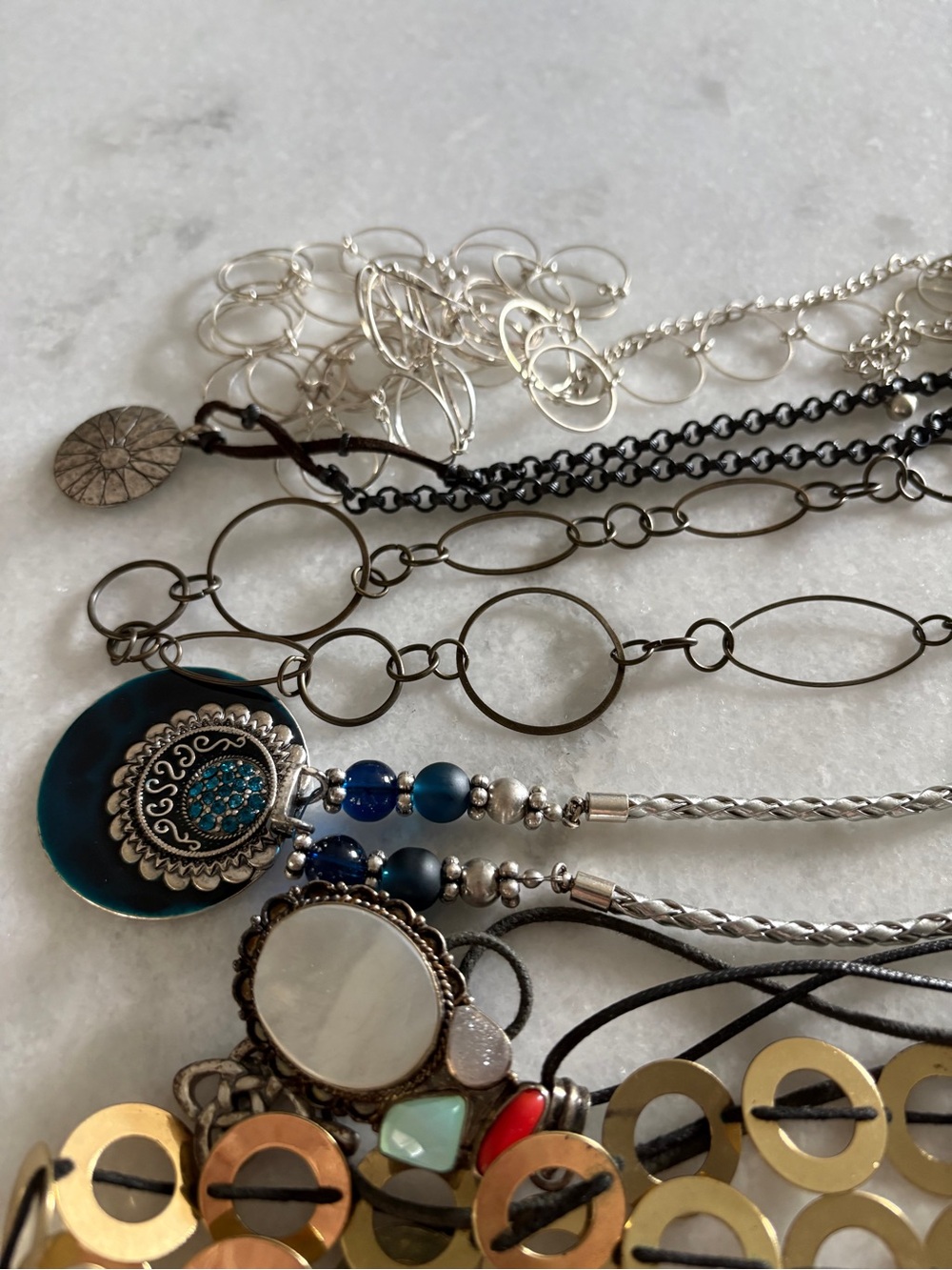 6 Boho necklaces, chains, stones,etc. All are in excellent condition.